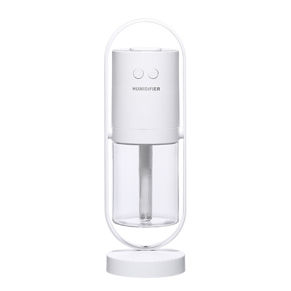 White humidifier with clear water tank on a white background