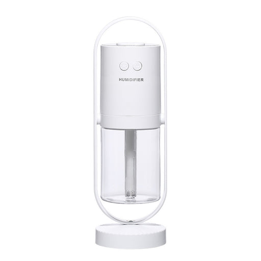 White humidifier with clear water tank on a white background