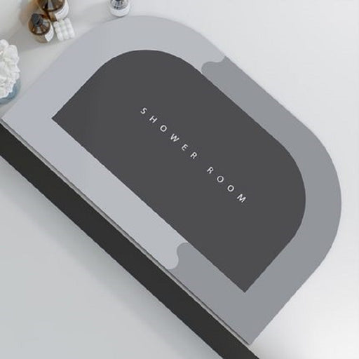 Gray and black mat with 'SHOWER ROOM' text on a light gray background