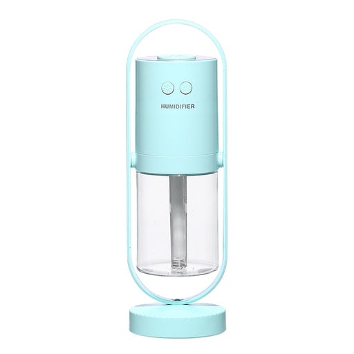 Portable humidifier with a light blue top and clear base on a white background
