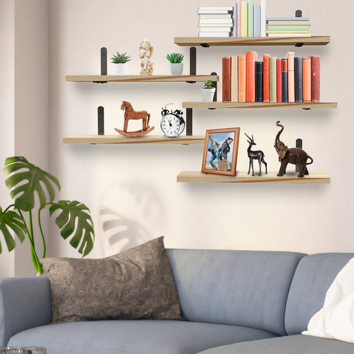 Floating Wall Shelves displaying books, plants, and decorative items in a stylish living room.