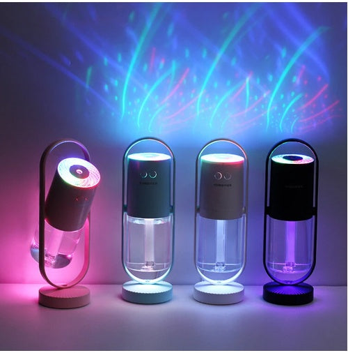 Four colorful cylindrical lights with LED lighting effects on a dark background