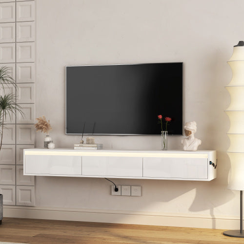Modern TV stand with a television mounted on a wall in a room.