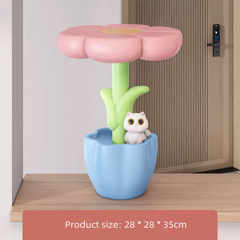 image Flower-shaped stool with a small white cat figurine in a blue pot on a wooden floor.